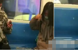 上海一名姑乘地铁一屁股坐炸羽绒服 旁边小伙被喷一身反应亮了